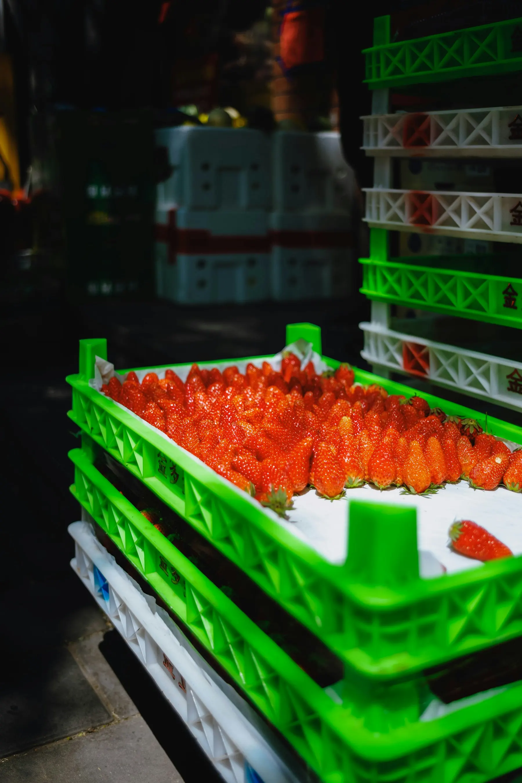 Fresh strawberries packed in produce crates