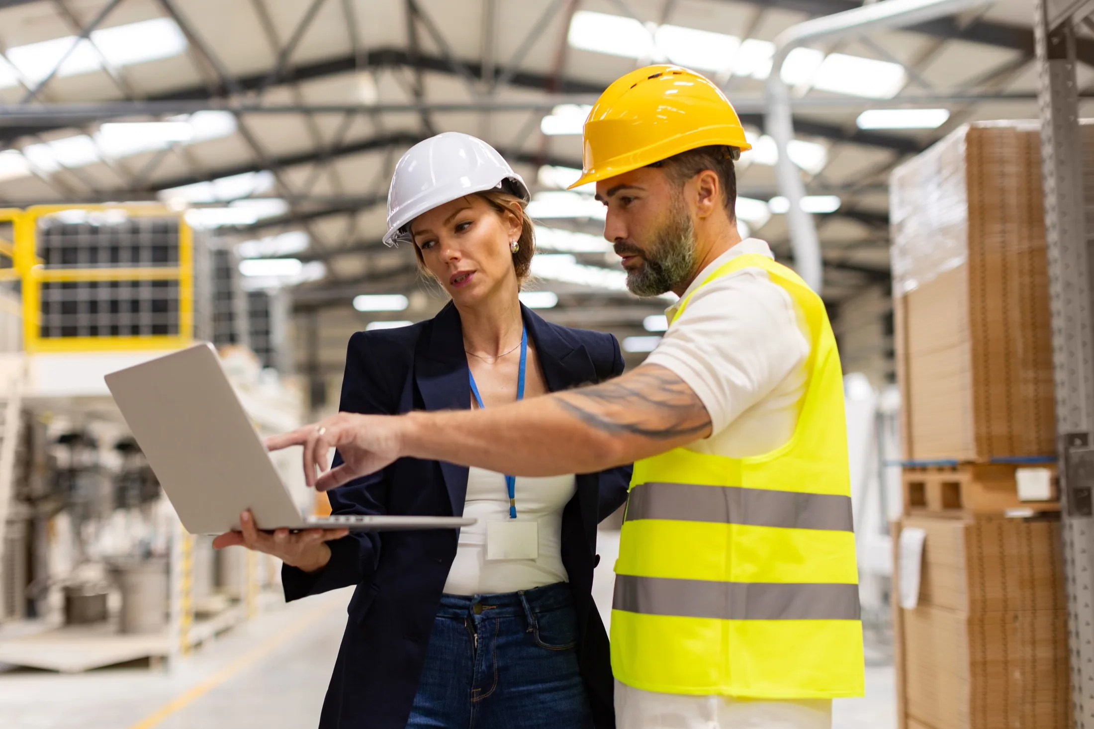 Logistics specialists reviewing warehouse operations